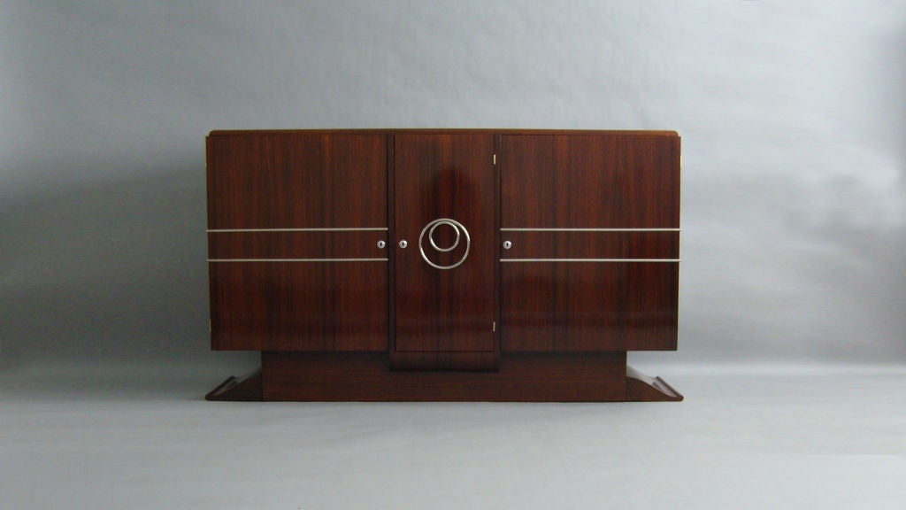 A French Art Deco Rosewood Sideboard/Buffet with Chromed details and 2 inside Drawers.