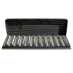 A Set of 12 Fine French Art Deco Crystal Knife Rests by Daum