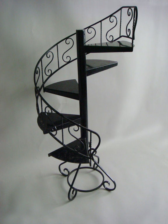 French 1940's black lacquered wrought iron decorative display staircase / plant stand.