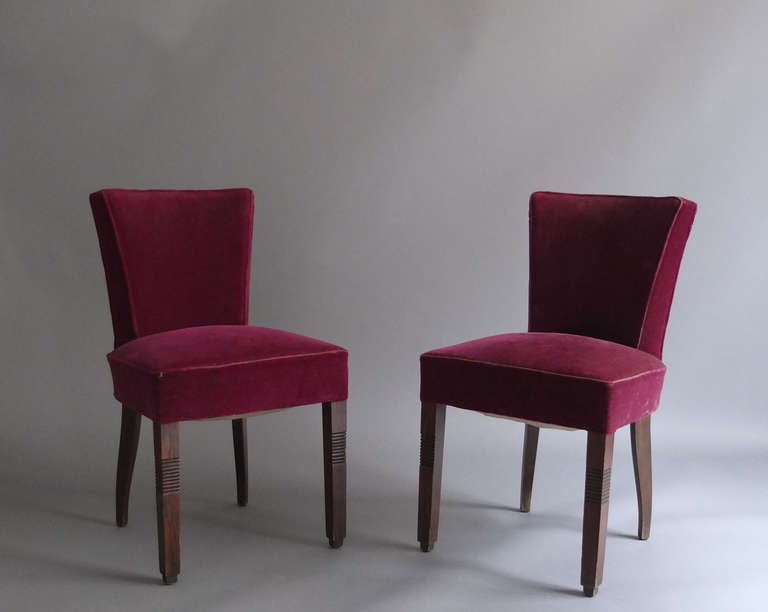 Set of four French Art Deco oak chairs by Dudouyt.