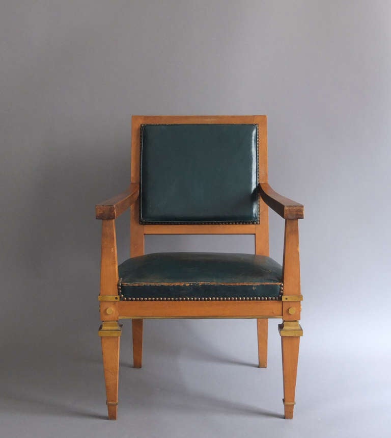 French Art Deco light mahogany desk chair fine bronze details with attributed to Arbus.
Matching desk / library table and three side arms are also available.