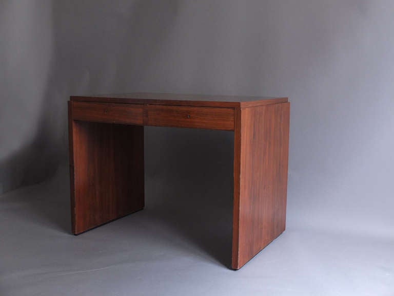 Fine French Art Deco rosewood desk or writing table with 2 drawers.
Matching bookcase available (see last picture).
 