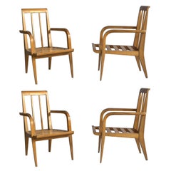 4 raffinate poltrone in ciliegio degli anni '50 di Roger Landault