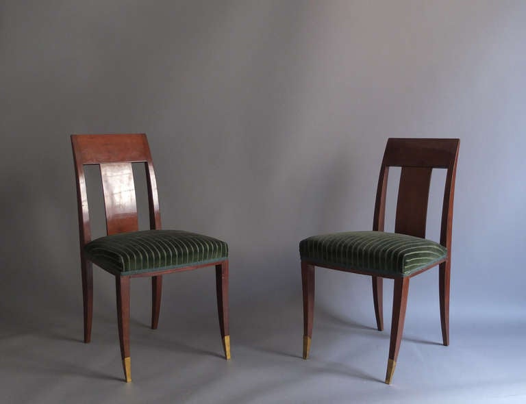 Pair of fine French Art Deco mahogany side chairs with bronze sabots in the manner of Alfred Porteneuve.