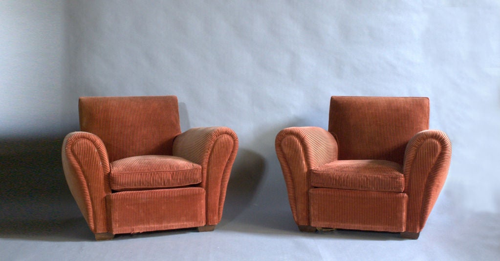 A pair of French Art Deco comfortable club armchairs.