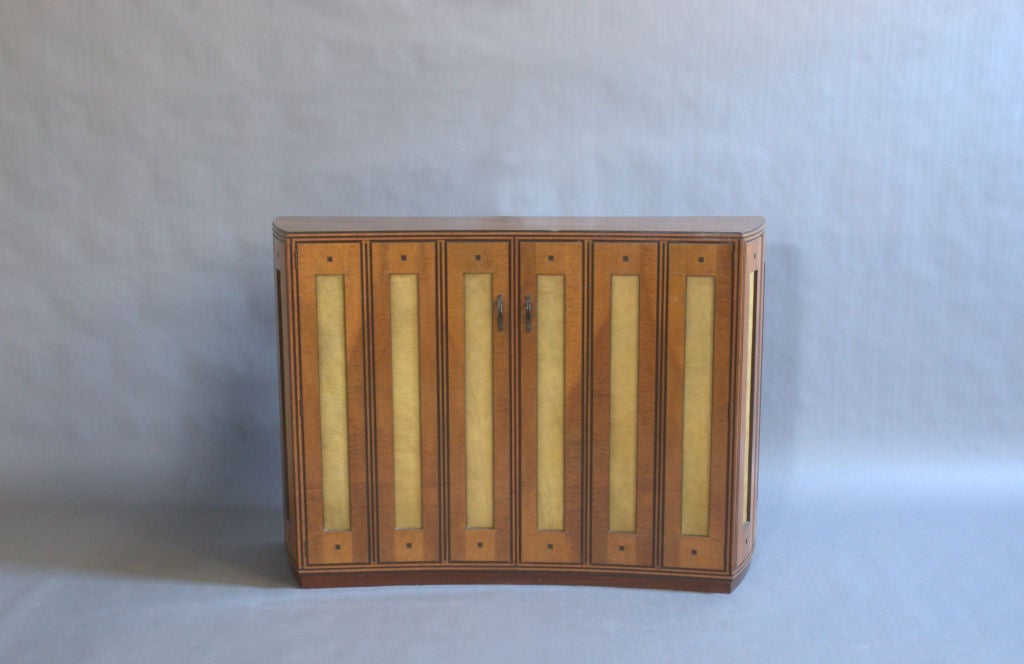 A Fine Spanish Bird's-Eye Maple and leather Cabinet. In Good Condition In Long Island City, NY