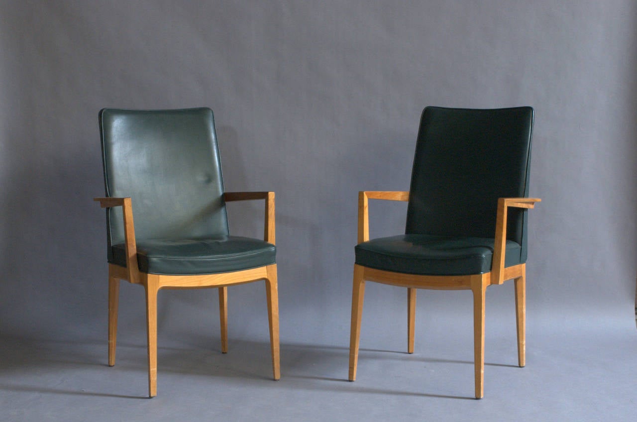 Set of four French 1950s office or lounge armchairs.