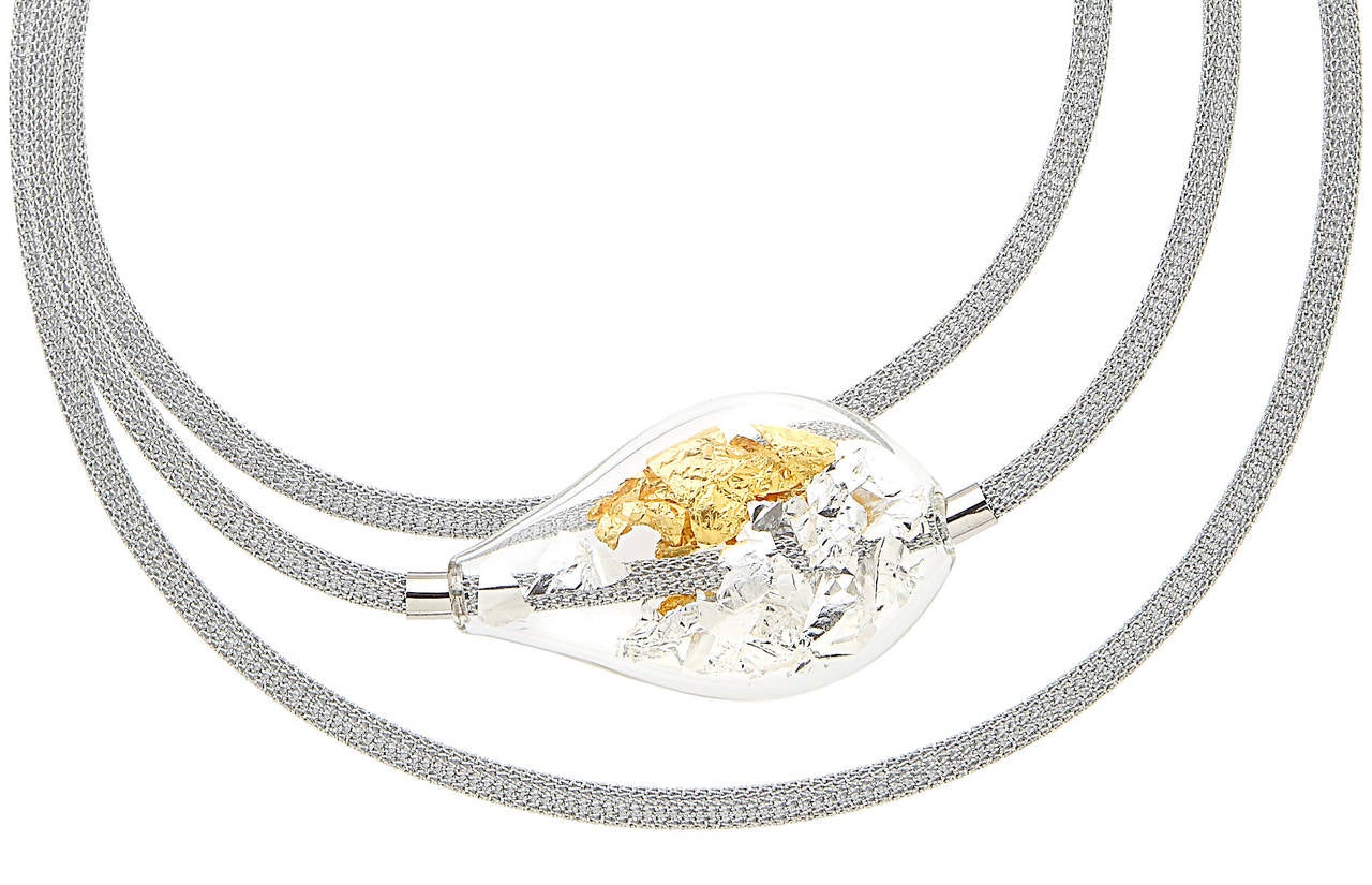 Lurex necklace, 45 cm + ext., silver elements 925, Murano blown glass with 24-karat gold and silver leaves. 
The Lurex fabric, used on the air collection, is soft, resistant, non-allergic, light weight and not tarnishing.