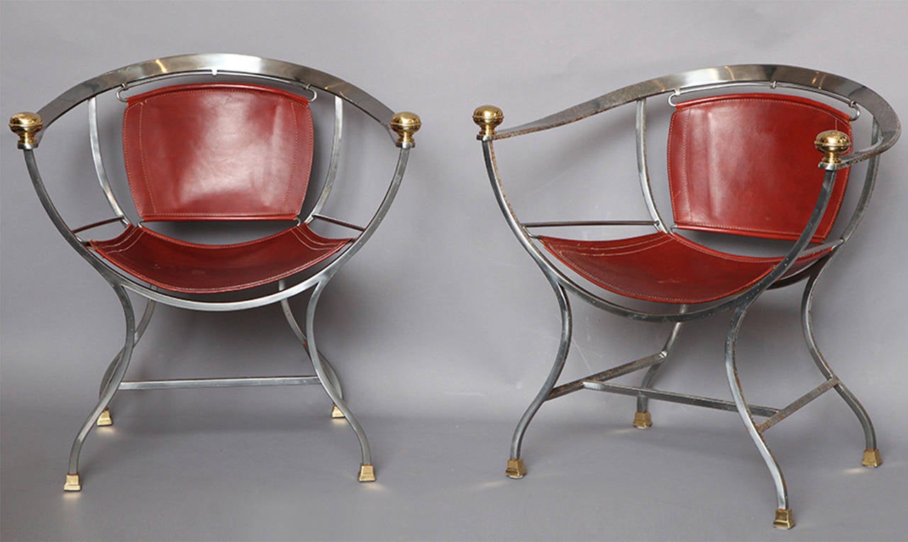 Pair of Pompeii armchairs with steel frames and brass accents. Seat and back are in rich sienna brown leather.
Italian, circa 1980.
