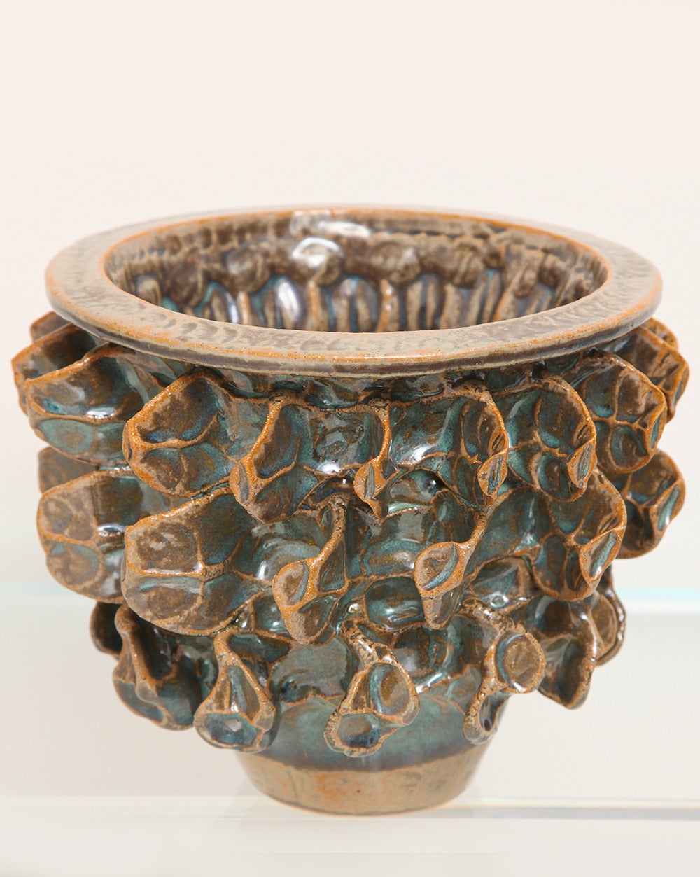 PAUL BRIGGS
Foliage Vase 2
Ceramic vessel with hand-pinched ivy leaf decoration and multicolor glaze.  
American, 2015