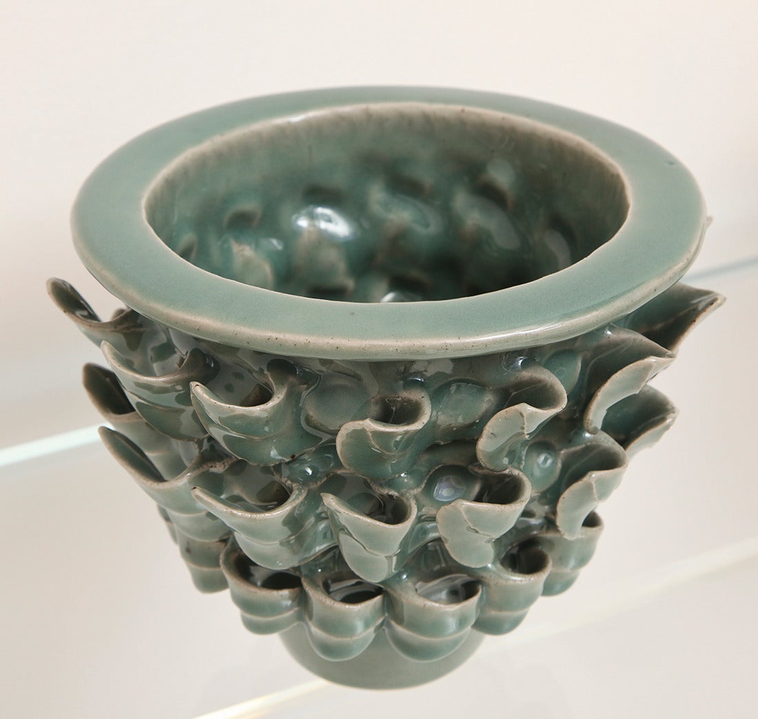 Paul Briggs
"Foliage Vase 1"
ceramic vessel with hand-pinched ivy leaf decoration and a pale blue glaze, 
American, 2015.