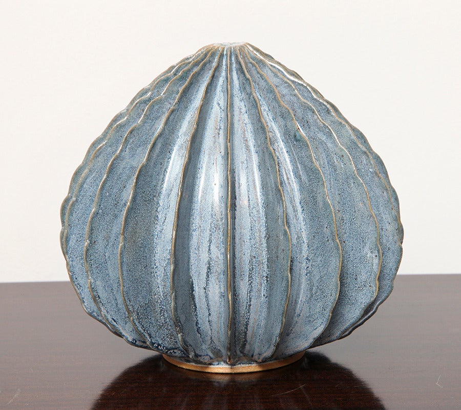 Bill Hudnut.
Medium pod in silky blue, from 2015.
Hand-built ceramic pod with applied rippled decoration and a silky blue glaze.