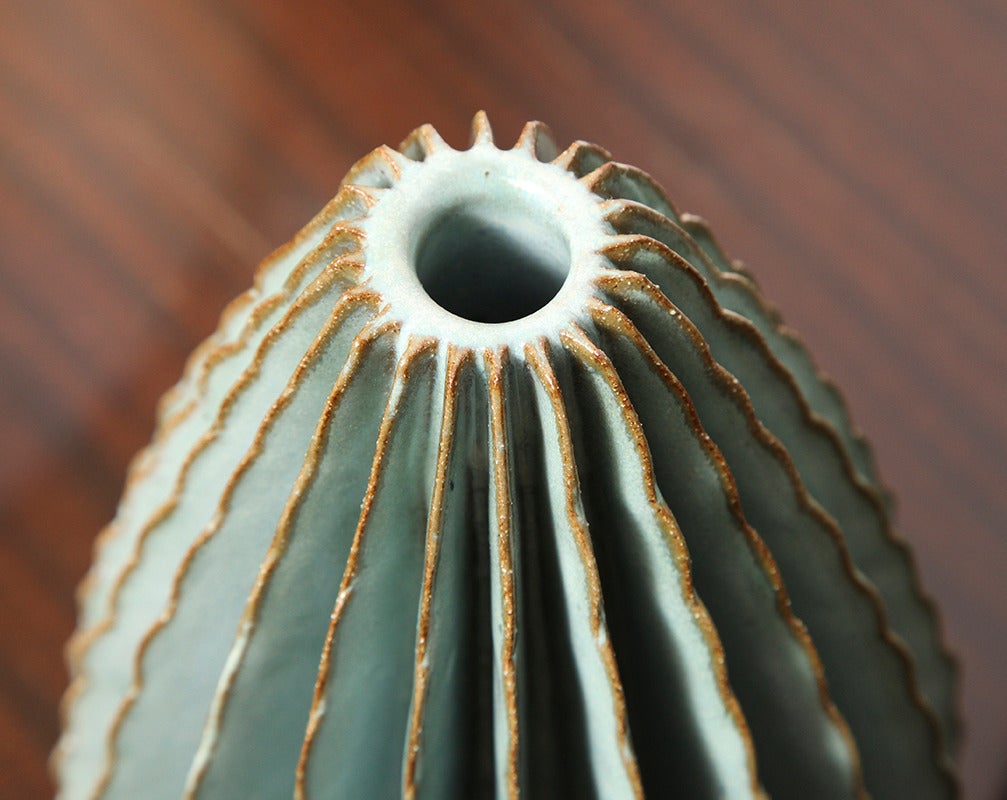 Bill Hudnut
Hand-built ceramic teardrop cone with applied rippled decoration and a Frost blue glaze. Wonderful tabletop object. 
American, 2015.
 