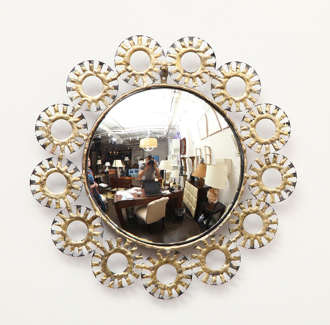 Marie Suri
The Chloe mirror
Round wall mirror with an option of a 1 or 2 row frame of steel medallions and bronze decoration. Plain, convex, and antiqued mirror finish available.
Made to order expressly for Liz O'Brien.
Measurements:
Single