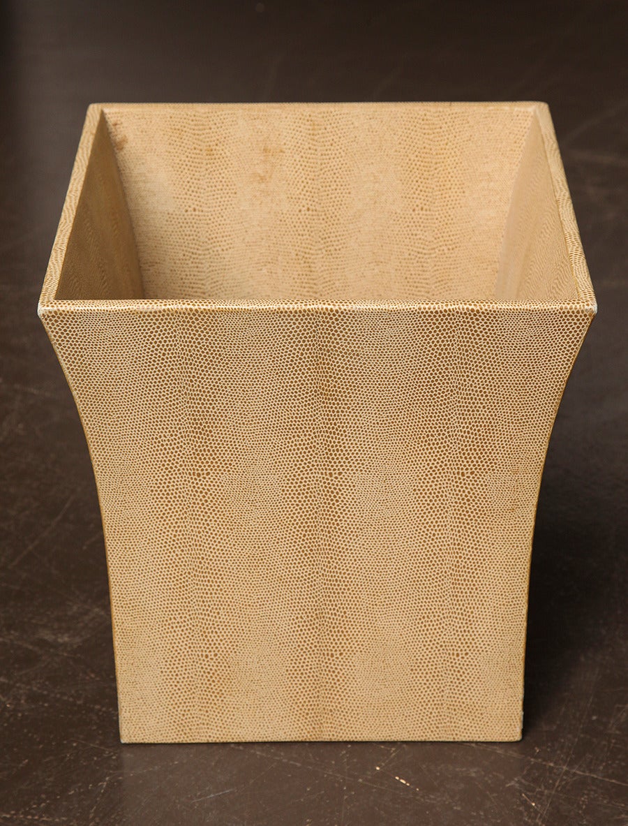 Karl Springer (1930-1991)
Square waste paper basket with curved sides wrapped entirely 
in tan lizard embossed leather.
American, circa 1980.