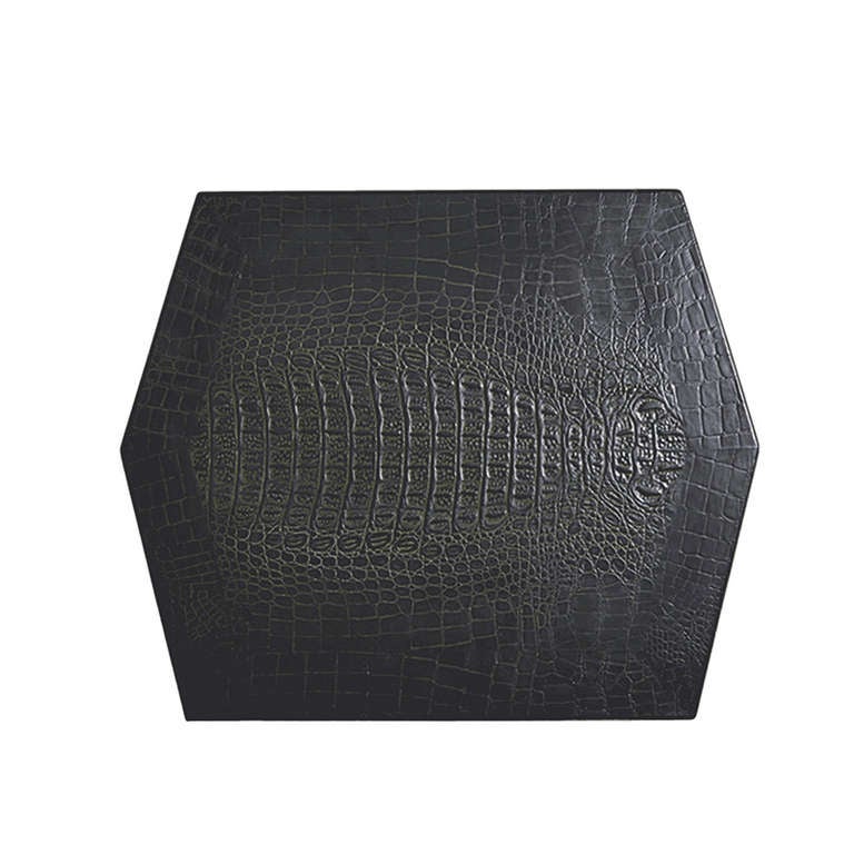 Karl Springer (1930-1991)<br />
Side table in embossed and painted leather.<br />
Original label affixed to bottom.<br />
Signed: Karl Springer 1987<br />
American, 1987