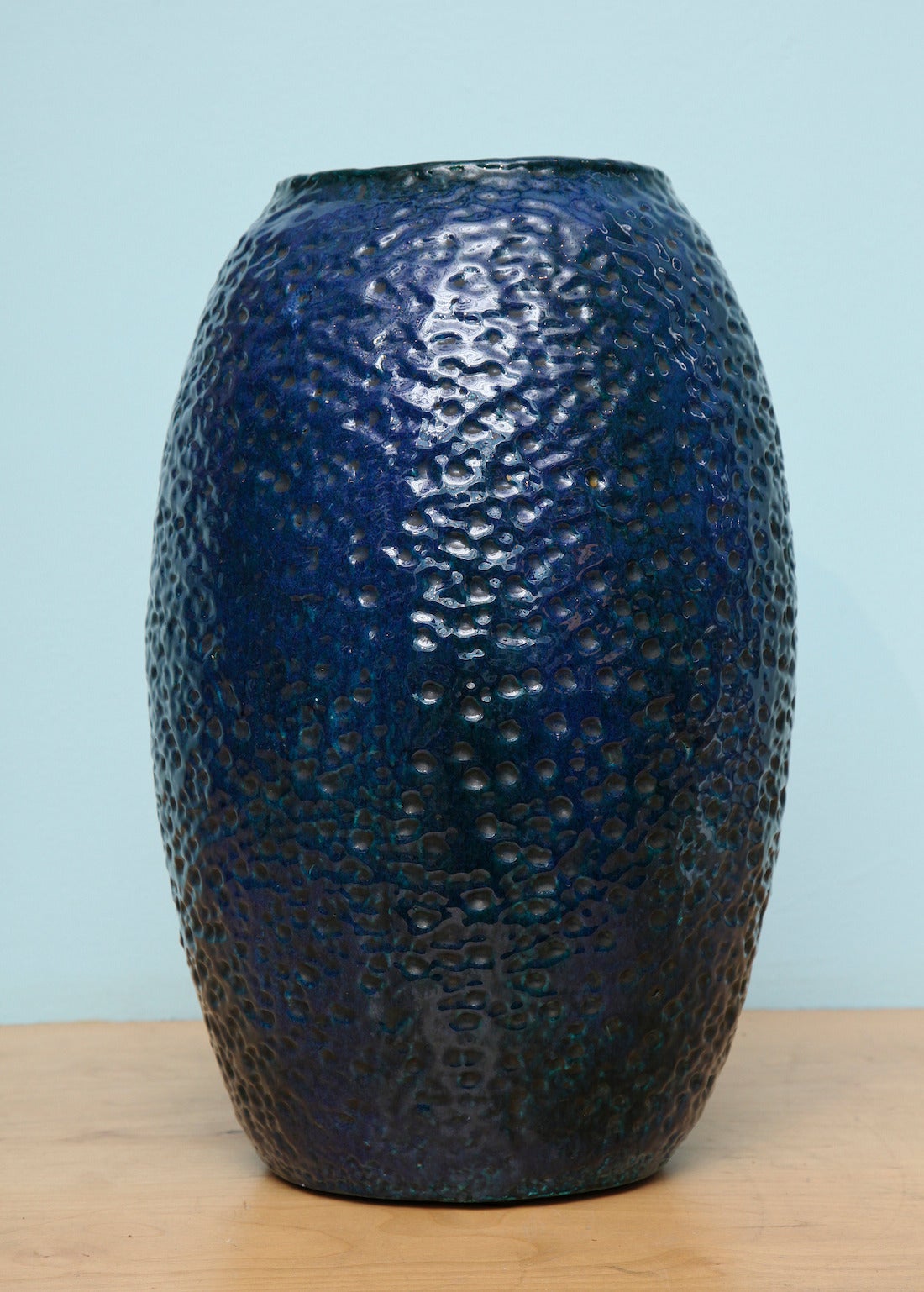 Large scale studio made vase by Marcello Fantoni. Hand-built stoneware vase with great texture throughout and deep blue glaze. Great scale and presence. Signed on underside.
