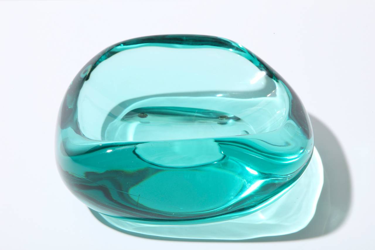 Hand-carved and polished bowl created from one large piece of crystal. Signed and numbered on underside.