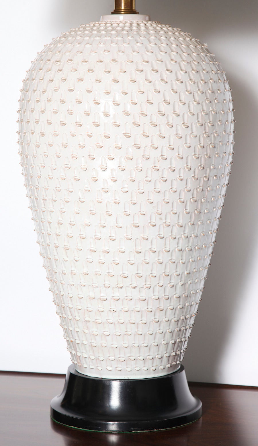  Monumental ceramic table lamp by Paul Laszlo. This custom-made lamp features a studio-made, large stoneware base with textured relief and white glaze. Ceramic made by Hegnetslund, Denmark, and is artist signed and dated, 1955. Custom mounts created