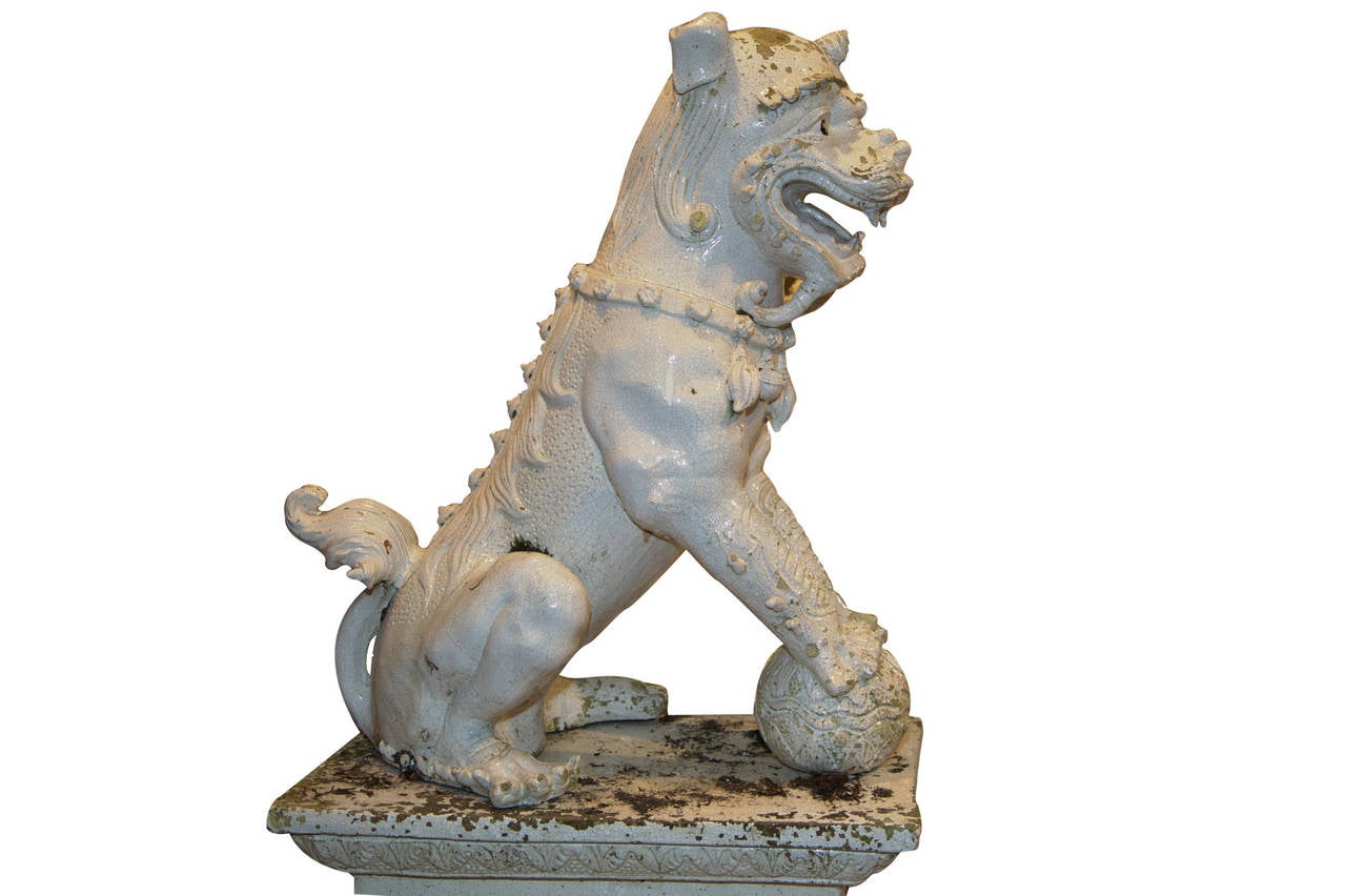 Pair of 19th Century White Ceramic Sculptures in the Form of Chinese Shishi (石獅) Lions.