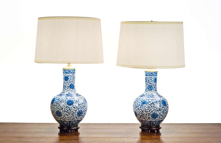 Pair of 20th Century Chinese Blue and White Porcelain Globular Lamps.
* Shades Not Included.
