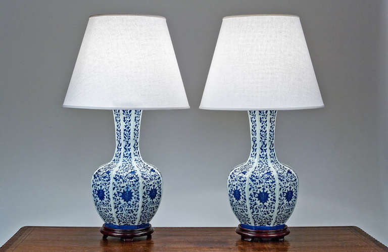 Pair of 20th century blue and white Chinese lamps.<br />
Shades Not Included.