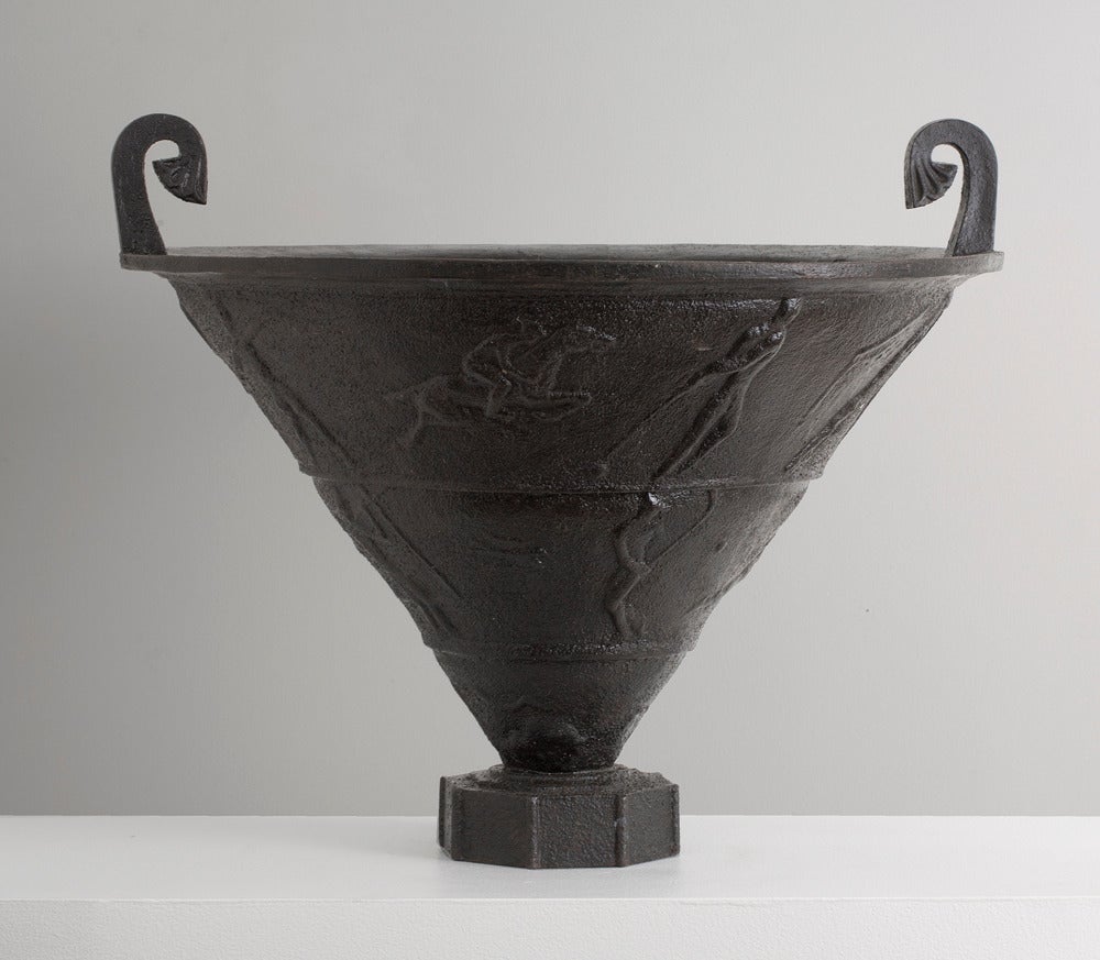 Designed by Rolf Bolin
Cast iron with relief decoration of different athletes in sporting events. An example of this urn was exhibited at the Swedish Pavilion at the Paris World Exhibition 1925. 

Published: Christian Bjork, Na¨fveqvarns