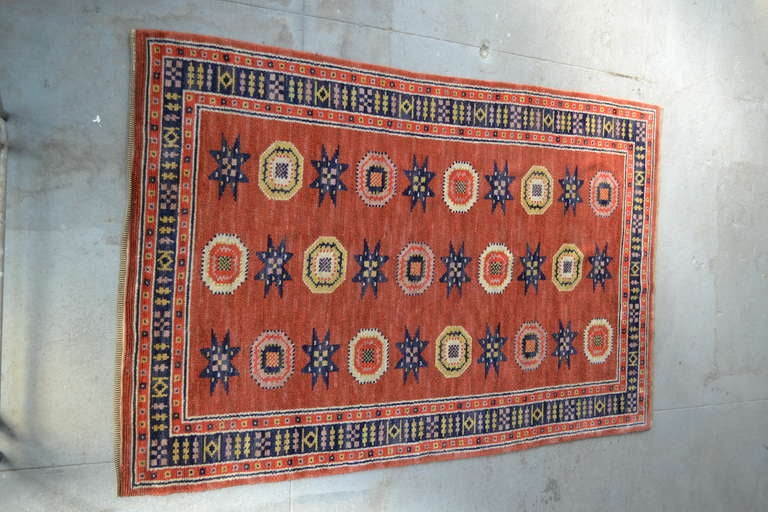 Beautiful carpet by Marta Mass Fjetterstrom of Sweden. Woven in the 1940's this carpet retains it's vibrant color and is in excellent condition.

98