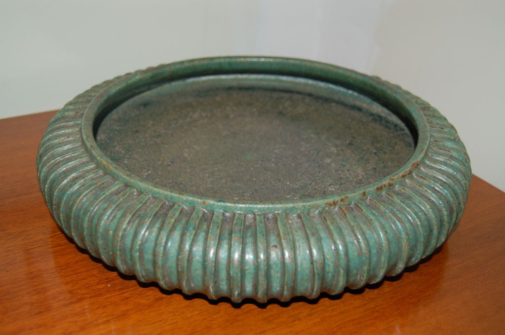 Architectual ribbed low bowl by Arne Bang. Unusual form with beautiful greenish grey glaze, perfectly executed.Artist mark  
