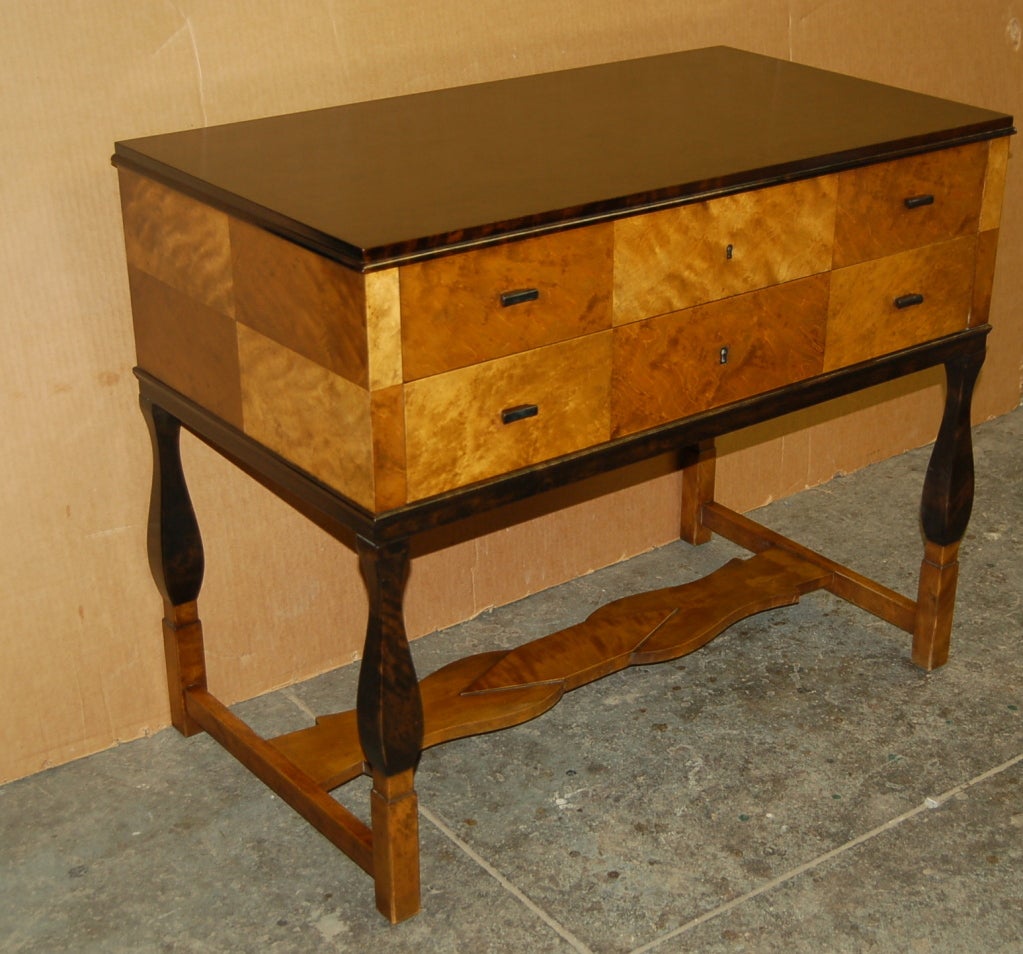 Beautiful checkerboard birch veneer console/dresser with 2 drawers. From the 