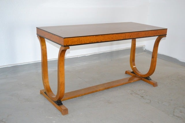 Elegant console table by Carl Malmsten for NK Sweden ca. 1930.
Birch with darkened woods accent.
Burned 