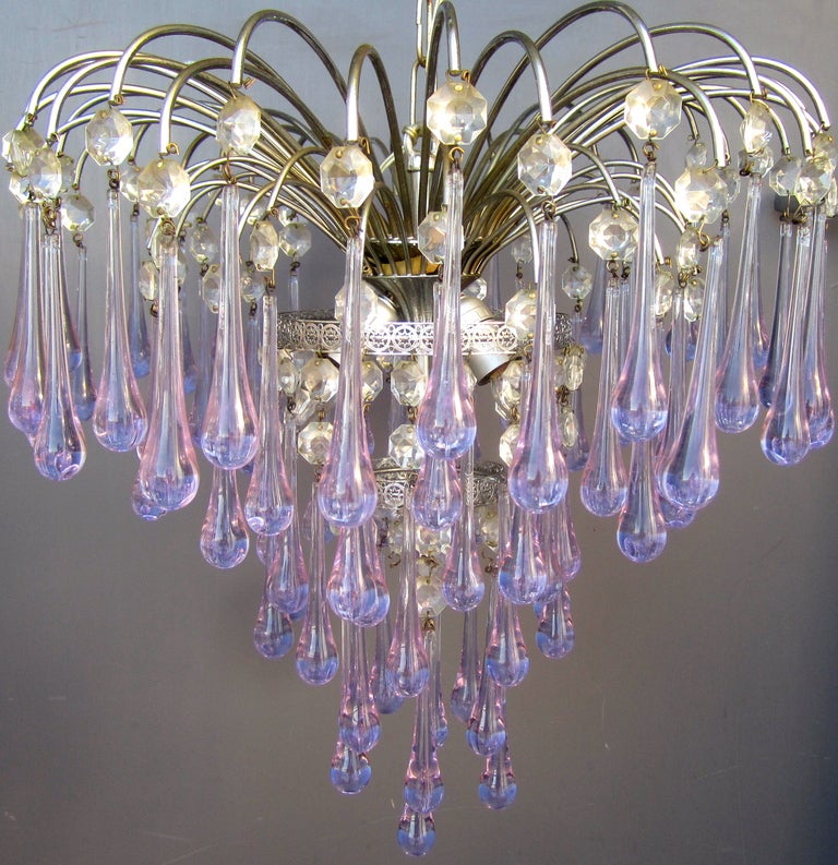 The lovely lilac color in this piece is so wonderfully subtle. Often, these are made of molded glass but in this case they teardrops are crystal. Ideally sized for a variety of applications.