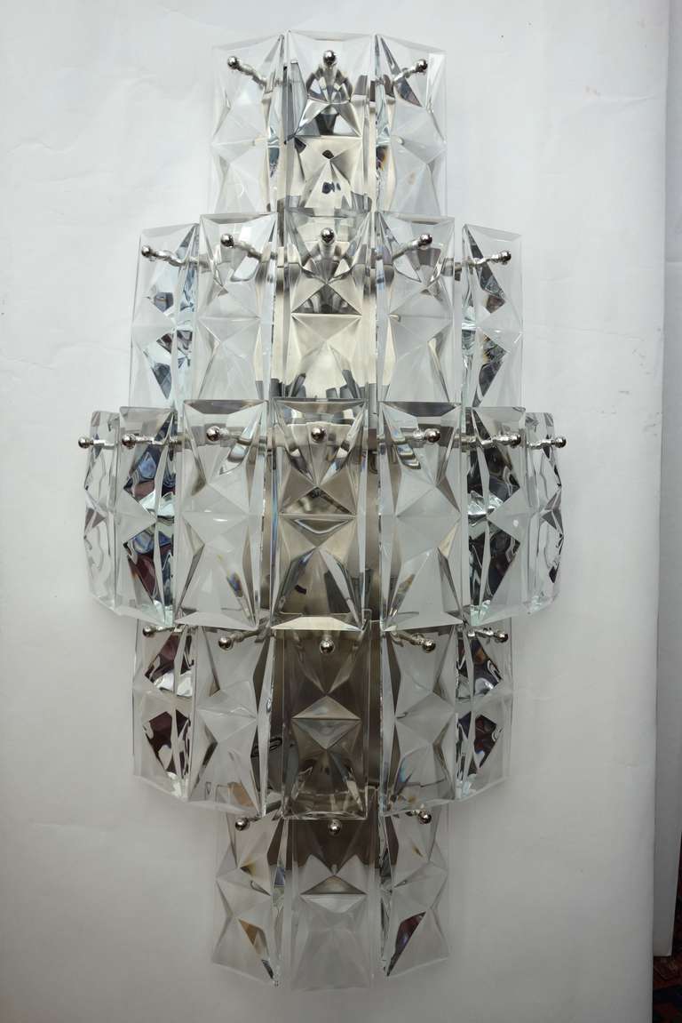 A ravishing set of three very large crystal sconces by Kinkeldey. Newly wired for US standards.