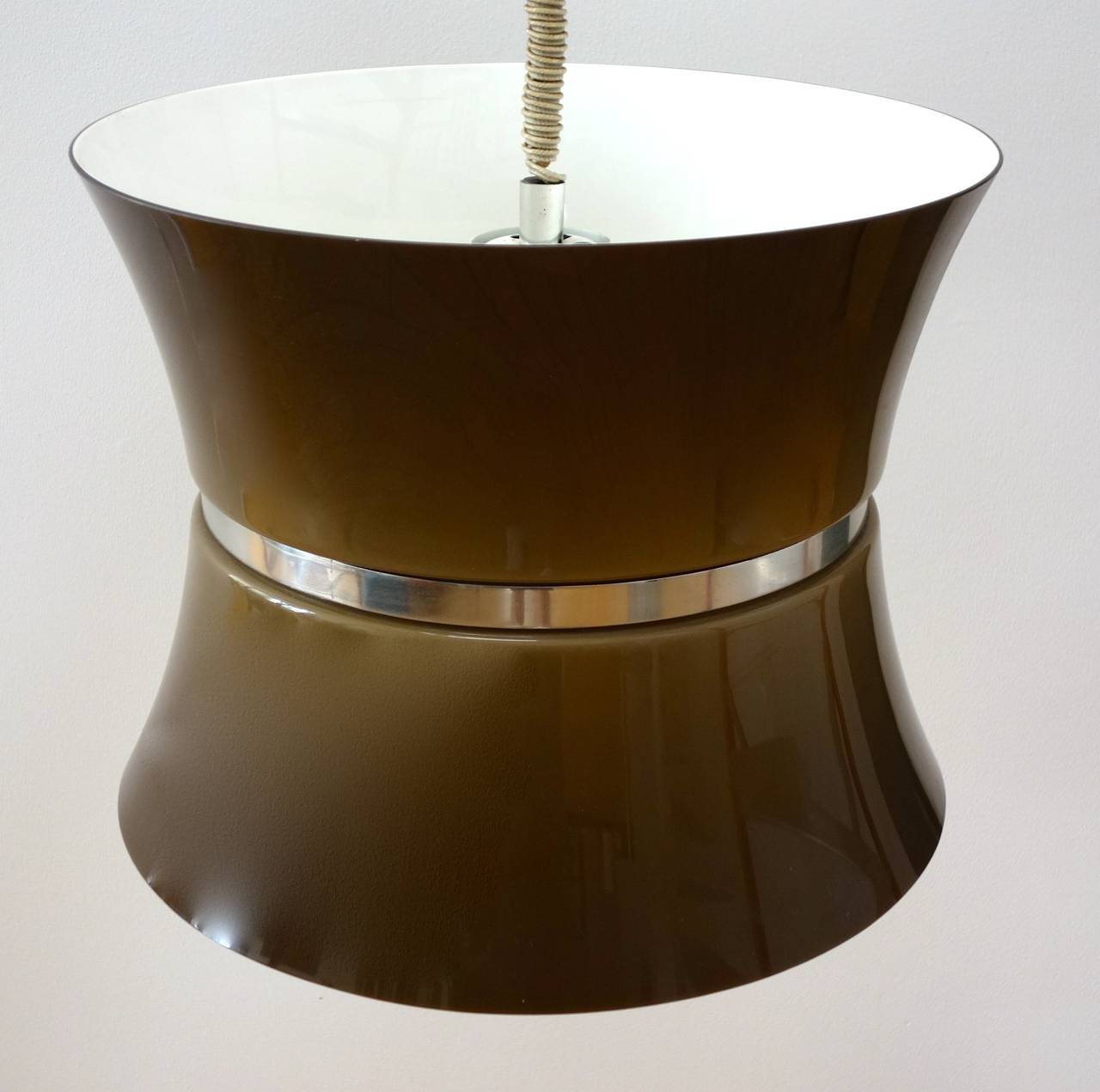 A fantastic, cylindrical shaped Italian pendant light from the 1970s.