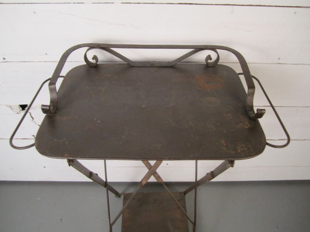 This is a super versatile folding wash stand with towel bars on either side.