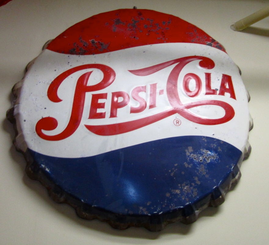 Exceptional bottle cap advertising sign by Pepsi Cola. A brilliant piece of art !