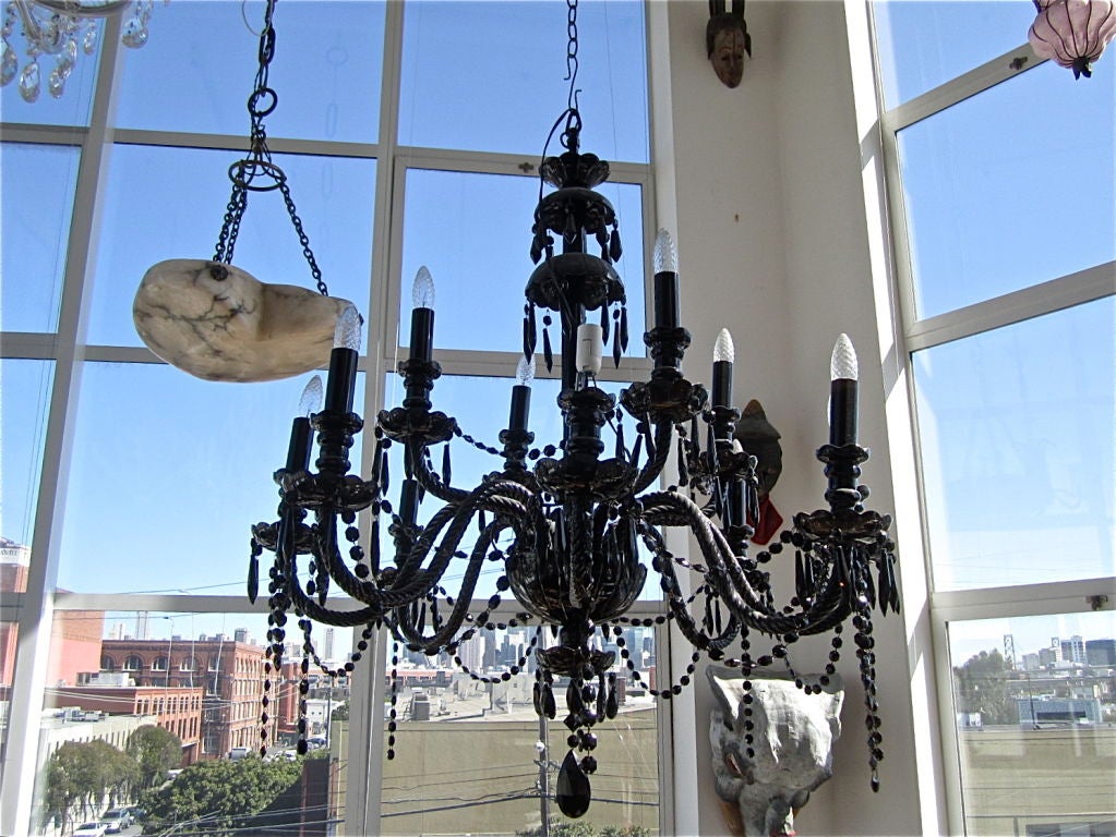 Elegant Marie Therese-style chandelier in black Czech crystal.

*We ship internationally* 