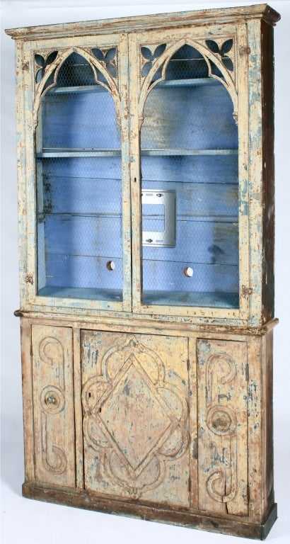 A wonderfully primitive French painted vaisselier. Recently outfitted with a bracket for a flat screen TV.