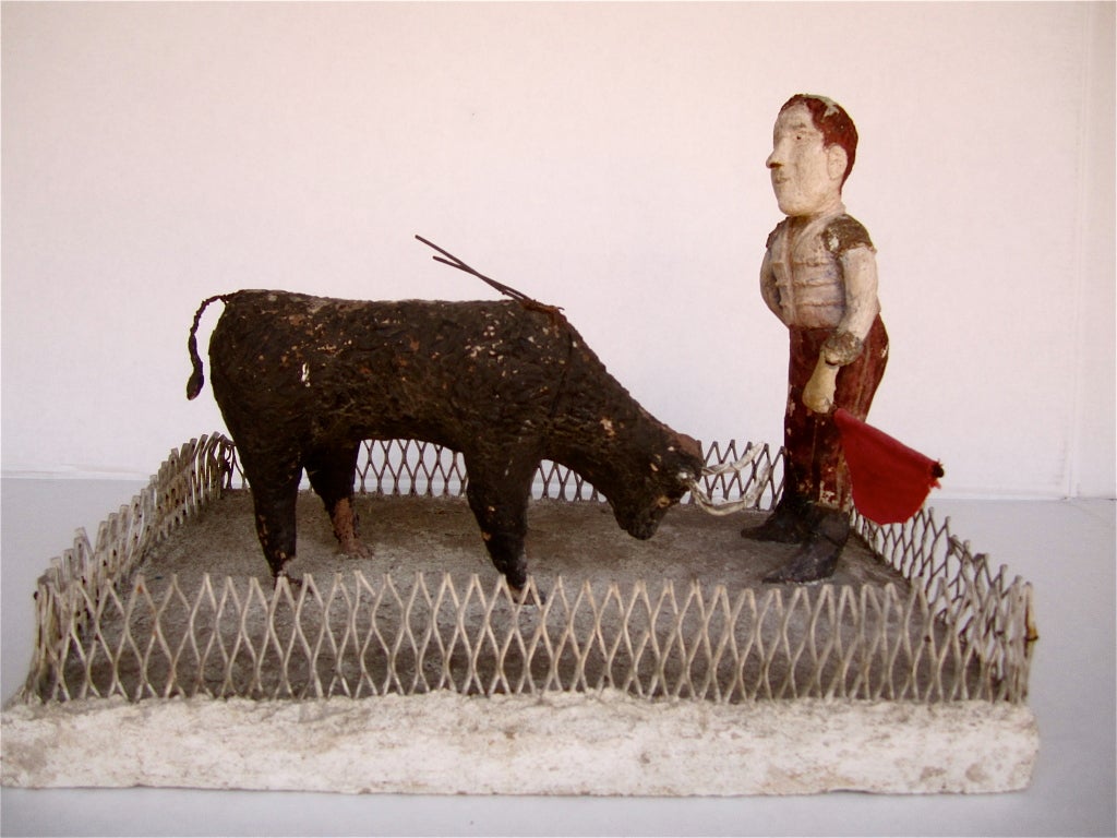 A sweet and naive depiction of a bullfighter and bull.

*We ship internationally* 