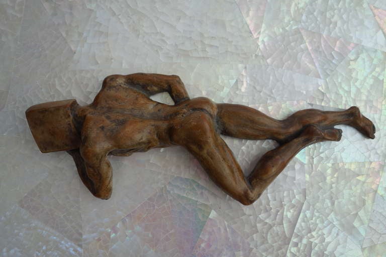 American Reclining Man Paperweight For Sale