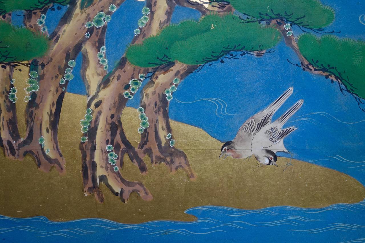 A magnificent six panel screen with design of pine forest islands (possibly inspired by views from Matsushima) with fishing traps and birds. Silver foil clouds with heavy pigments on paper. A formidable expression from the Kano School circa