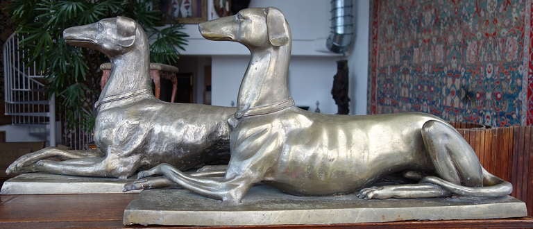A commanding pair of beautiful hounds ready to stand (sit) guard at the entrance to your home. From the esteemed collection of Aileen Getty.
