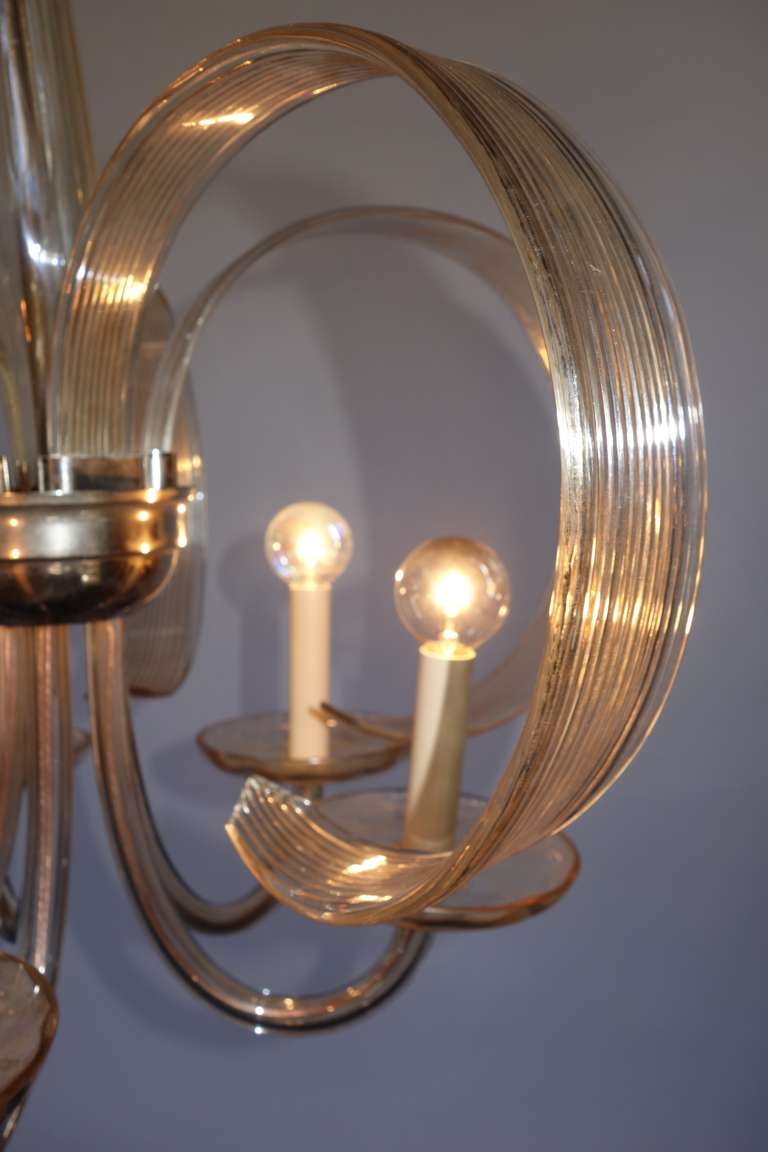 A lyrical Czech blown glass chandelier newly refitted and wired for US standards.