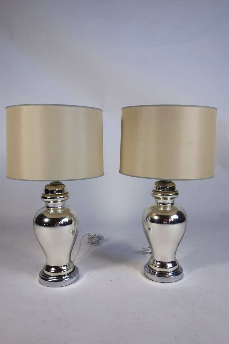 A stately pair of mercury glass table lamps from the collection of Aileen Getty.