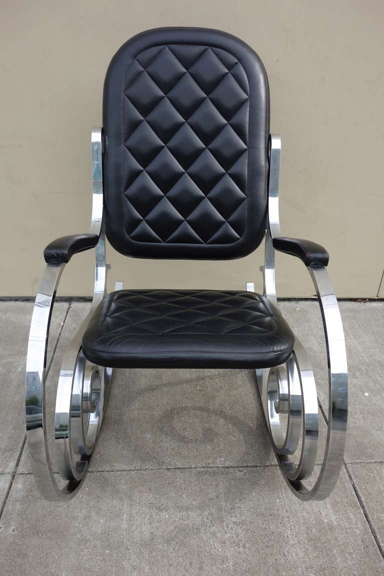 A super chic and imminently comfortable Maison Jansen chrome rocker. I had not seen this form expressed in anything other than bentwood so this was definitely a pleasant surprise. The harlequin patterned back and seat set it apart from all