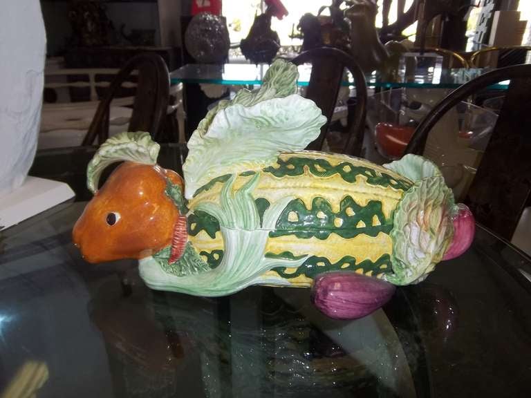 An Italian ceramic tureen of a rabbit who has been formed from varrying vegetables.
fun object