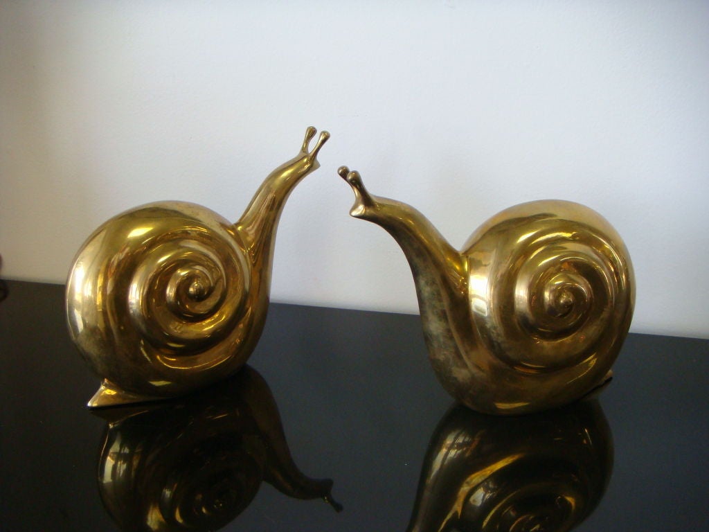 A pair of brass snail sculptures. These have a whimsical appeal. Detail is fantastic and they are a great size.