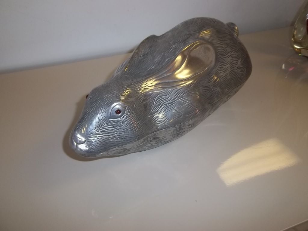 A whimsical lidded dish depicting a rabbit by Arthur Court.This piece has great detail down to the small beaded red eyes and fur like strokes of the metal