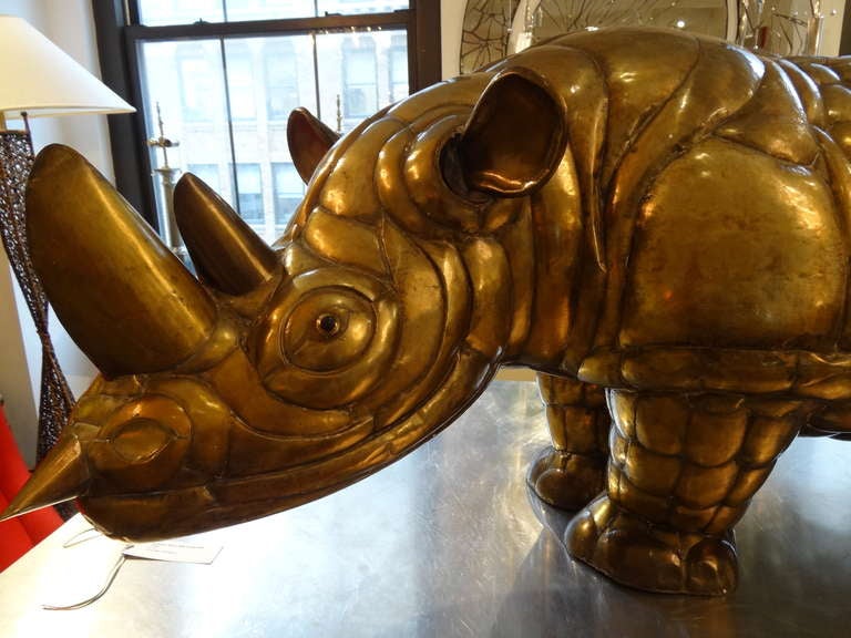 A beautifully detailed large sculpture of a Rhino.
Piece is signed and numbered by Sergio Bustamante.