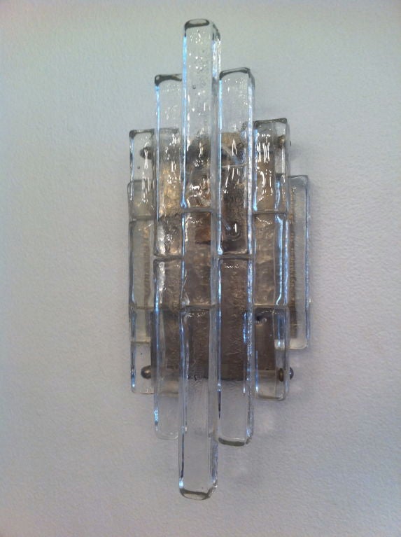 A pair of hand crafted Italian 1960s  glass wall lights by the famed Italian maker, Poliarte . Aged steel fittings and frame.